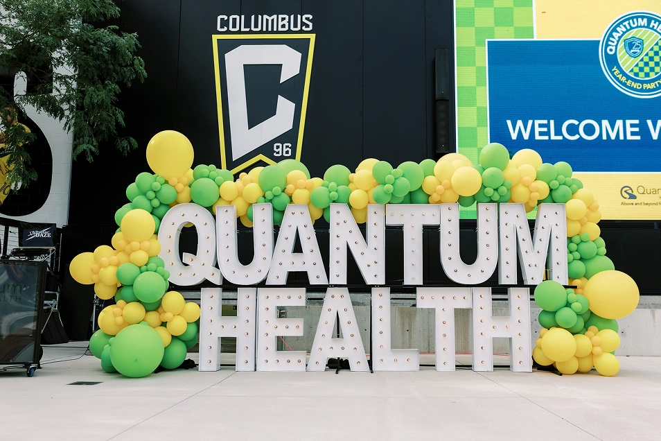 Corporate event photography at the Lower.com Field with Quantum Health